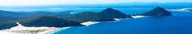 Aerial view over Port Stephens coastline